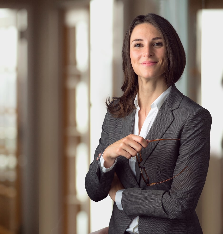 lawyer holding an eye glasses